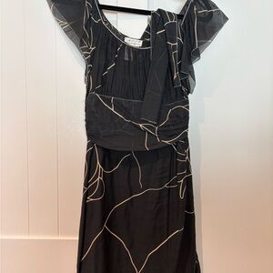 Elegant Black Dress with Gold Accents